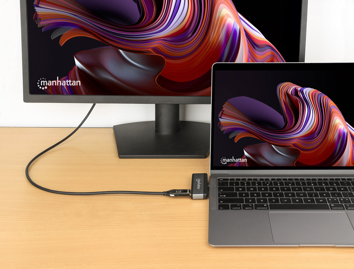 Manhattan USB-C Travel Dock/Hub, Ports (x4): HDMI, USB-A, USB-C and 3.5mm audio, With Power Delivery (100W) to USB-C Port, USB powered (no external power supply required)